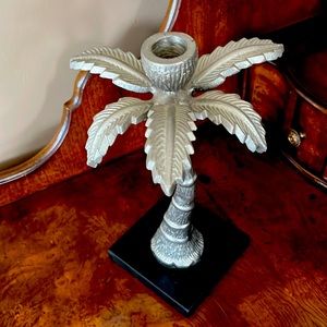 Metal and marble palm tree candle holder.